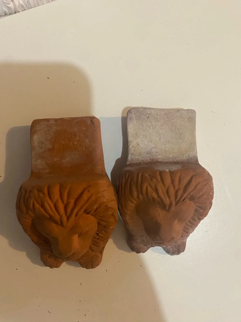 Terracotta Lion Head red / orange Home Accent terracotta lion head planter feet